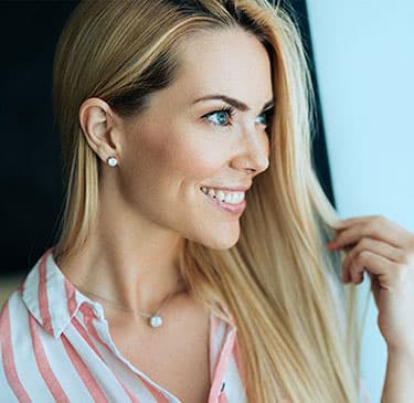 blonde woman side profile smiling