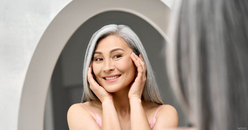 Woman after a brow lift procedure. (Model)