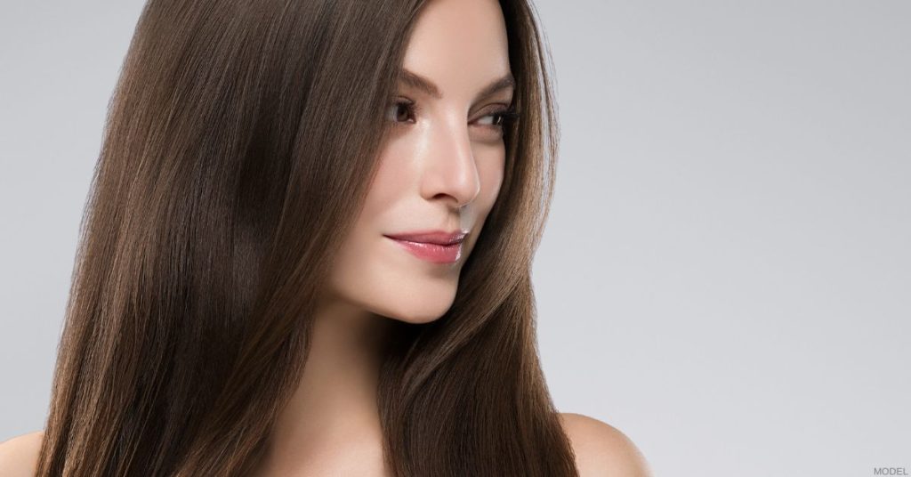 Woman after a successful revision rhinoplasty (model)
